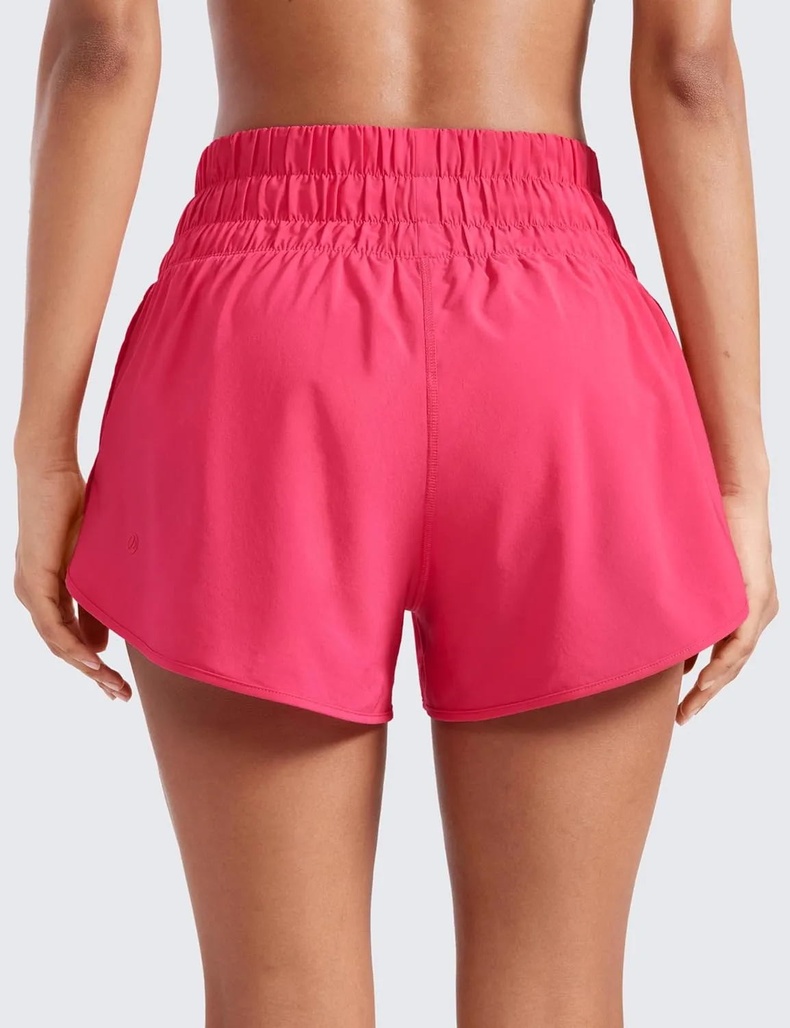 CRZ YOGA High Waisted Dolphin Running Shorts for Womens Mesh Liner for Gym Workout Athletic with Zipper Pocket